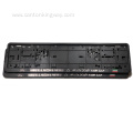 Number plate holder with embossed chrome logo